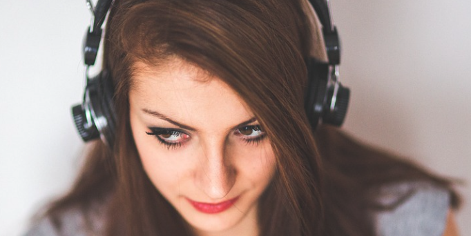 girl wearing headphone